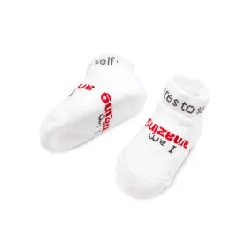 I am amazing® white baby socks with red words (3-12 mo)